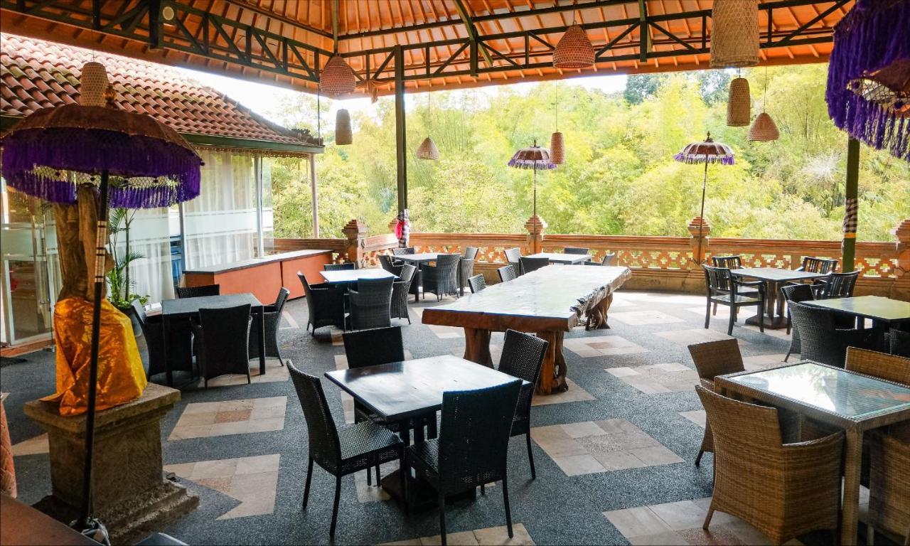 Ubud Hotel & Cottages Маланг Экстерьер фото