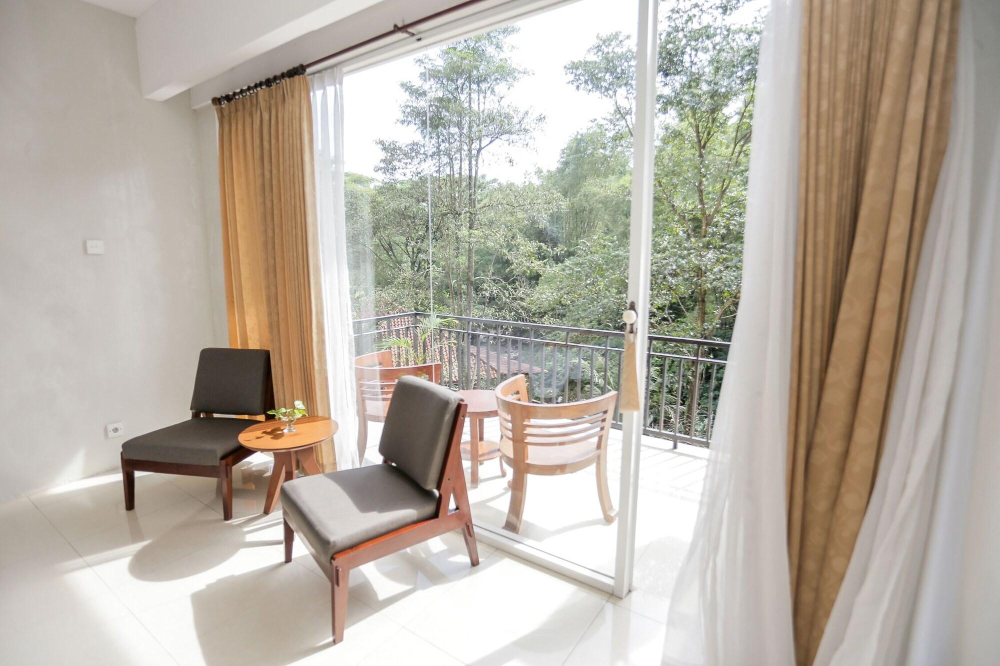 Ubud Hotel & Cottages Маланг Экстерьер фото